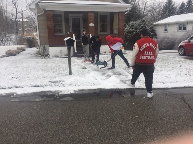 Specialized Learning Students Shoveling Snow