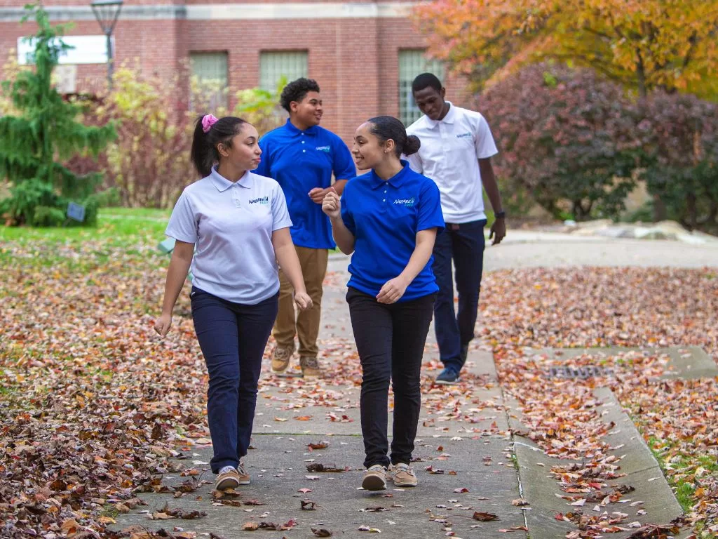 A group of Nazareth Prep students walking on campus